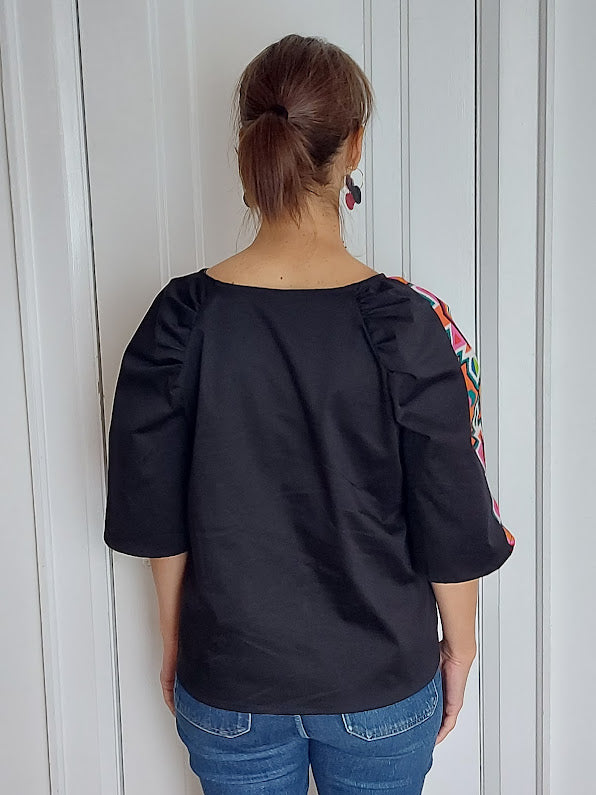 The gathered raglan sleeves top...